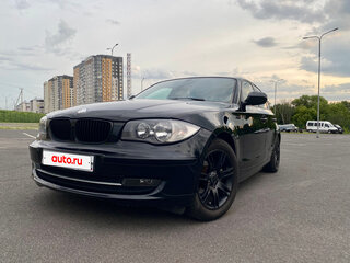 2011 BMW 1 серии 118i I (E81/E82/E87/E88) Рестайлинг, чёрный, 700000 рублей, вид 1