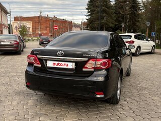 2010 Toyota Corolla X (E140, E150) Рестайлинг, чёрный, 830000 рублей, вид 4