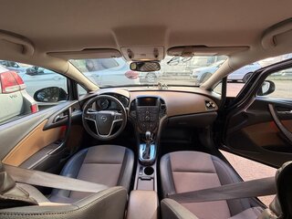 2014 Opel Astra J Рестайлинг, коричневый, 1360000 рублей, вид 4