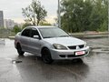 2006 Mitsubishi Lancer IX Рестайлинг, серебристый, 400000 рублей - вид 1