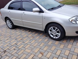 2006 Toyota Corolla IX (E120, E130) Рестайлинг, серебристый, 700000 рублей, вид 1