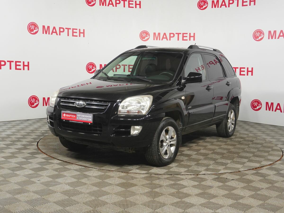 Открыть фотографии: Kia Sportage II