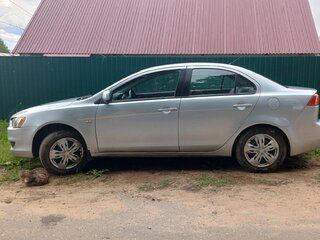 2009 Mitsubishi Lancer X, серебристый, 510000 рублей, вид 5