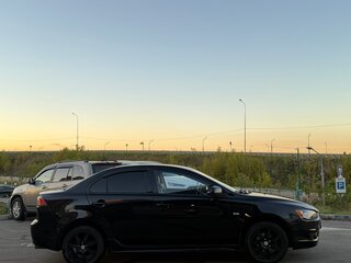 2010 Mitsubishi Lancer X, чёрный, 650000 рублей, вид 3