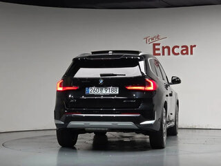 2024 BMW X1 18d sDrive III (U11/U12), чёрный, 5329000 рублей, вид 4