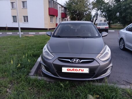 2013 Hyundai Solaris I, чёрный, 730000 рублей, вид 1