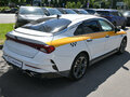2021 Kia K5 III, жёлтый - вид 3