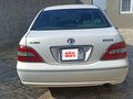 2002 Toyota Brevis I, бежевый - вид 1