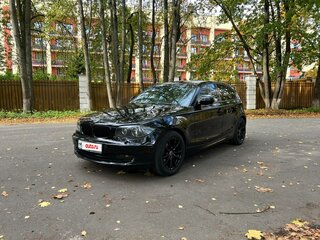 2011 BMW 1 серии 118i I (E81/E82/E87/E88) Рестайлинг, чёрный, 700000 рублей, вид 1
