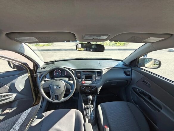 2010 Kia Rio II Рестайлинг, бежевый - вид 5