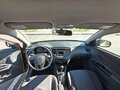 2010 Kia Rio II Рестайлинг, бежевый - вид 5