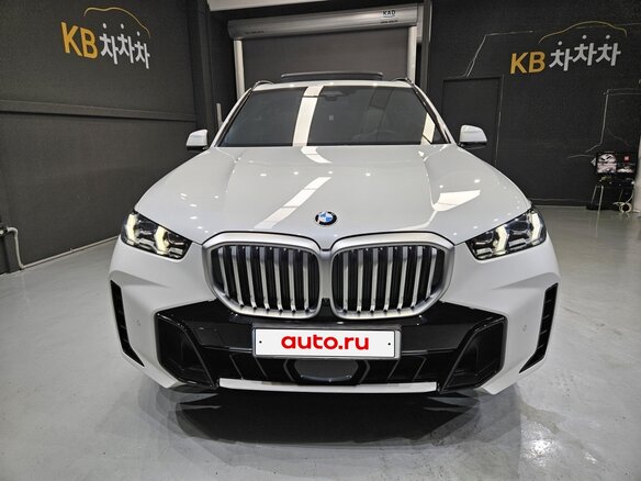 2024 BMW X5 30d IV (G05/G18) Рестайлинг, белый - вид 2