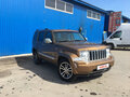 2011 Jeep Cherokee IV (KK), коричневый - вид 1