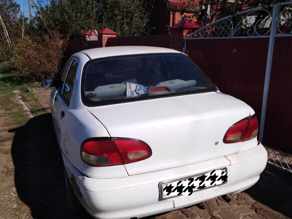 1998 Kia Avella, белый - вид 2