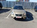 2010 Kia Rio II Рестайлинг, бежевый