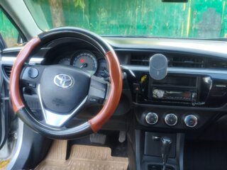 2014 Toyota Corolla XI (E160, E170, E180), серый, 950000 рублей, вид 5