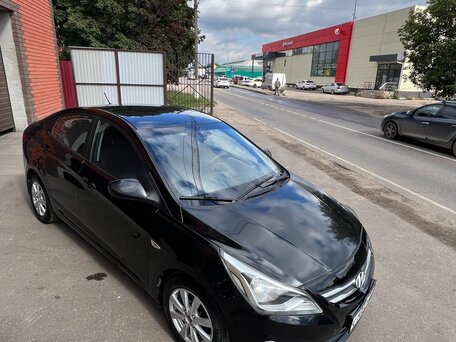2016 Hyundai Solaris I Рестайлинг, чёрный, 700000 рублей, вид 1