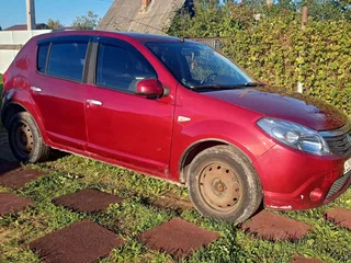 2011 Renault Sandero I, пурпурный, 550000 рублей, вид 3