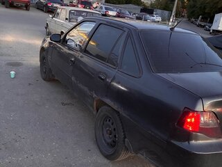 2010 Daewoo Nexia I Рестайлинг, чёрный, 70000 рублей, вид 2