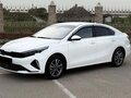 2023 Kia K3 II (China Market) Рестайлинг, белый - вид 2