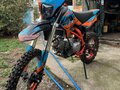 2024 Kayo Evolution YX140EM, оранжевый - вид 1