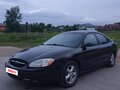2001 Ford Taurus IV, чёрный - вид 2