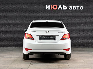 2014 Hyundai Solaris I Рестайлинг, белый, 720000 рублей, вид 2