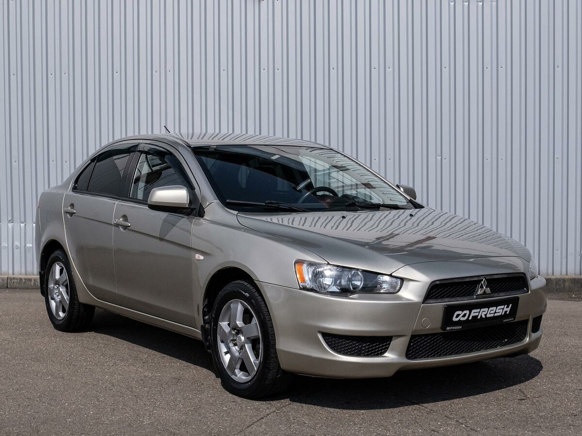 Открыть фотографии: Mitsubishi Lancer X