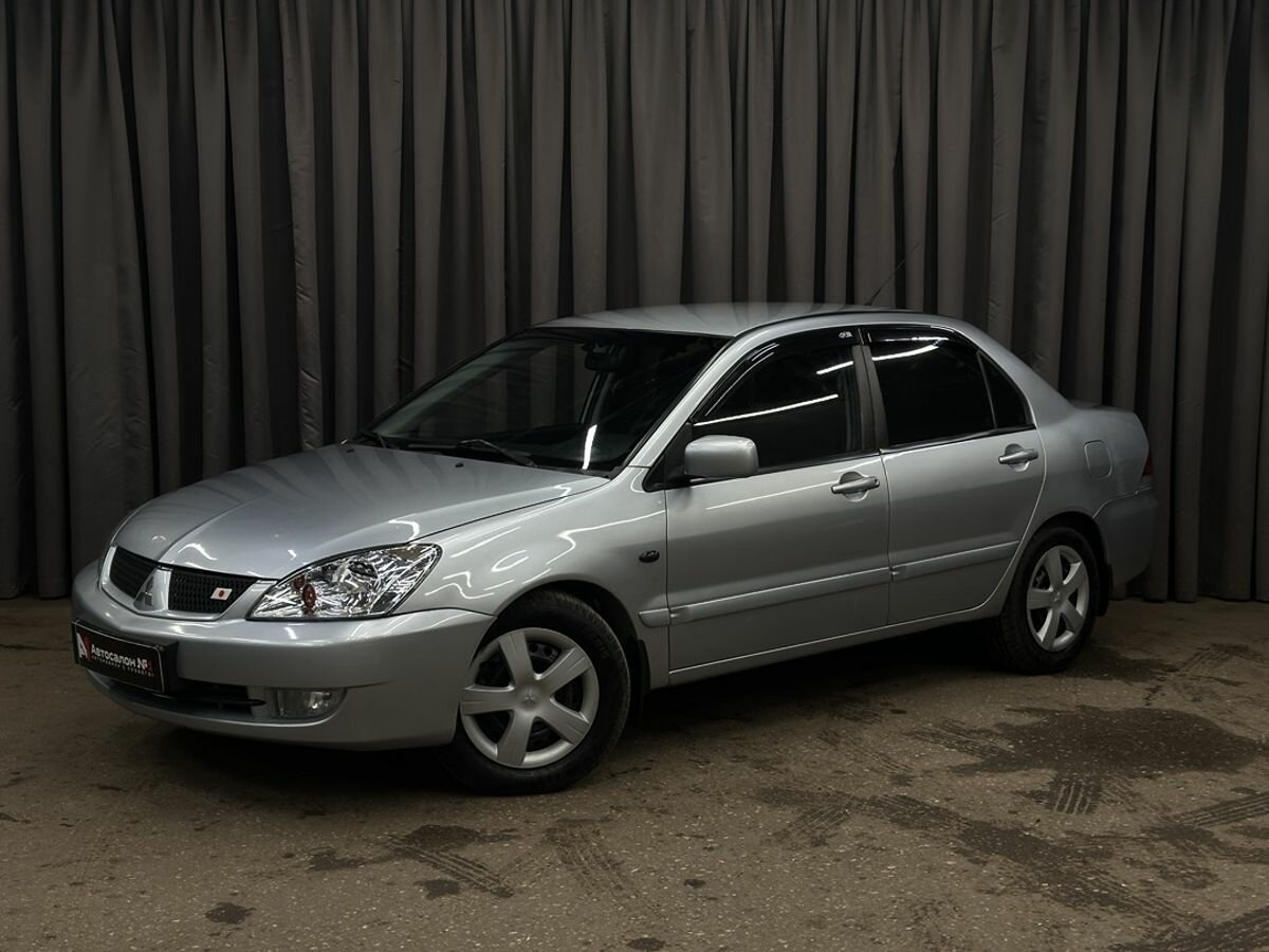 Открыть фотографии: Mitsubishi Lancer IX Рестайлинг