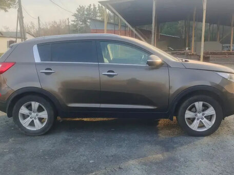 2012 Kia Sportage III, коричневый, 1300000 рублей, вид 3