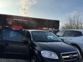 2010 Chevrolet Aveo I Рестайлинг, чёрный, 450000 рублей - вид 2