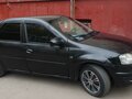 2011 Renault Logan I Рестайлинг, чёрный, 200000 рублей - вид 3