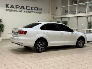 2016 Volkswagen Jetta VI Рестайлинг, белый, 1120000 рублей, вид 2