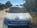 2015 Mitsubishi Outlander III Рестайлинг 2, белый, 1350000 рублей - вид 1