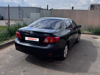 2009 Toyota Corolla X (E140, E150), чёрный, 670000 рублей, вид 4