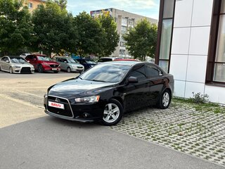 2010 Mitsubishi Lancer X, чёрный, 720000 рублей, вид 2