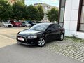 2010 Mitsubishi Lancer X, чёрный, 720000 рублей - вид 1