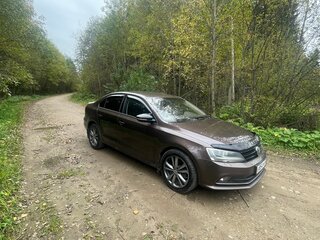 2015 Volkswagen Jetta VI Рестайлинг, коричневый, 1100000 рублей, вид 1