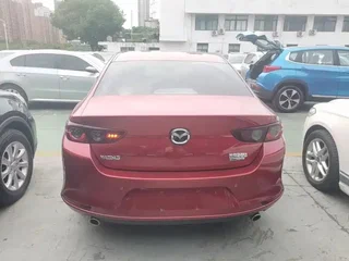 2023 Mazda 3 Axela IV (BP), пурпурный, 1378000 рублей, вид 3
