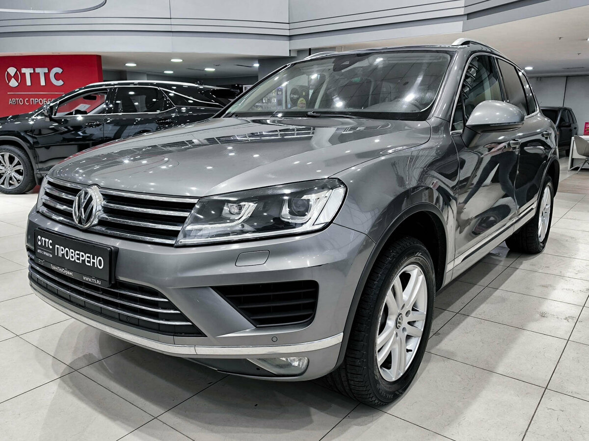 Открыть фотографии: Volkswagen Touareg II Рестайлинг