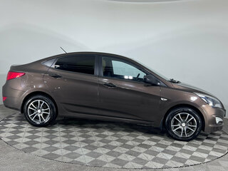 2014 Hyundai Solaris I Рестайлинг, коричневый, 905000 рублей, вид 4