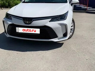 2021 Toyota Corolla XII (E210), белый, 1765000 рублей, вид 2