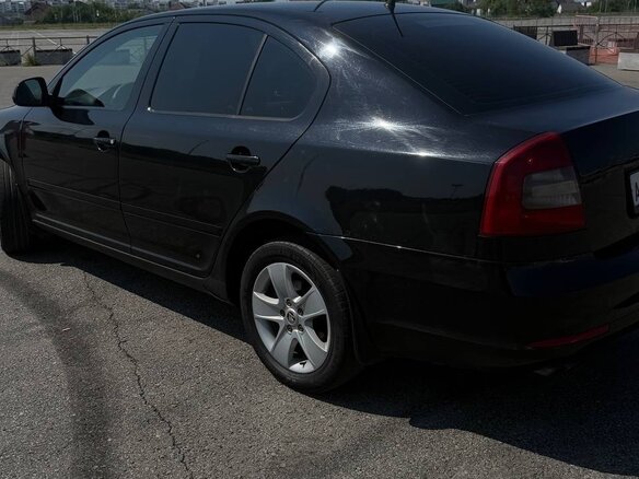 2011 Skoda Octavia II (A5) Рестайлинг, чёрный, 650000 рублей - вид 4