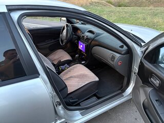 2010 Nissan Almera Classic I, серебристый, 620000 рублей, вид 4