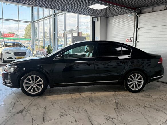 2012 Volkswagen Passat B7, чёрный - вид 2
