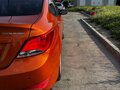 2014 Hyundai Solaris I Рестайлинг, оранжевый, 950000 рублей - вид 11