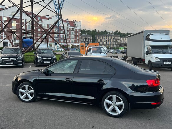 2012 Volkswagen Jetta VI, чёрный, 750000 рублей - вид 4