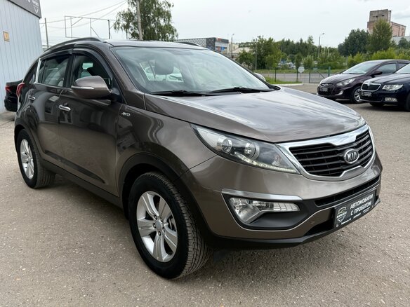 2011 Kia Sportage III, коричневый, 1235000 рублей - вид 3