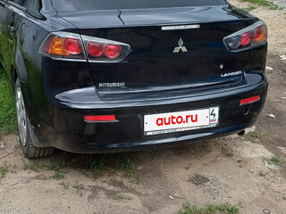 2013 Mitsubishi Lancer X Рестайлинг, чёрный, 560000 рублей, вид 2