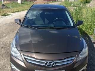 2016 Hyundai Solaris I Рестайлинг, коричневый, 930000 рублей, вид 2